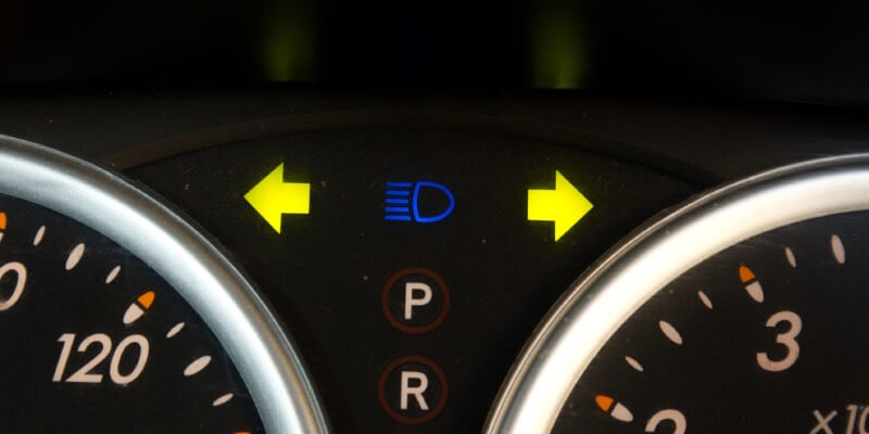 Indicator lights on a car dashboard