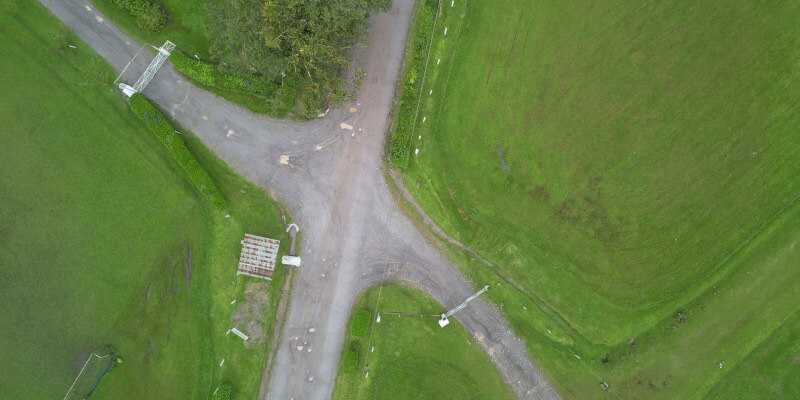Aerial view of a crossroad junction with no markings